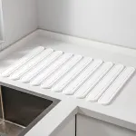 Oval Shaped Engraved Inner Frame Foldable Diatomaceous Earth Drying Mat – Super Absorbent, Fast-Drying, Non-Slip Kitchen Countertop Mat – White