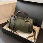 Vintage Tote Bag: Spacious multi-pocket design with tassel and metal accents, supports multiple carrying methods, combining practicality and style.