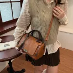 Vintage Tote Bag: Spacious multi-pocket design with tassel and metal accents, supports multiple carrying methods, combining practicality and style. – Green