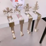 4-Pack No-Drill Metal Christmas Hooks​ – Gold tree and snowflake design, universal hanging bracket for fireplace mantels and door frames. (golden)